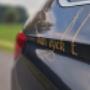 Van Eyck Taxi Gent logo op de auto